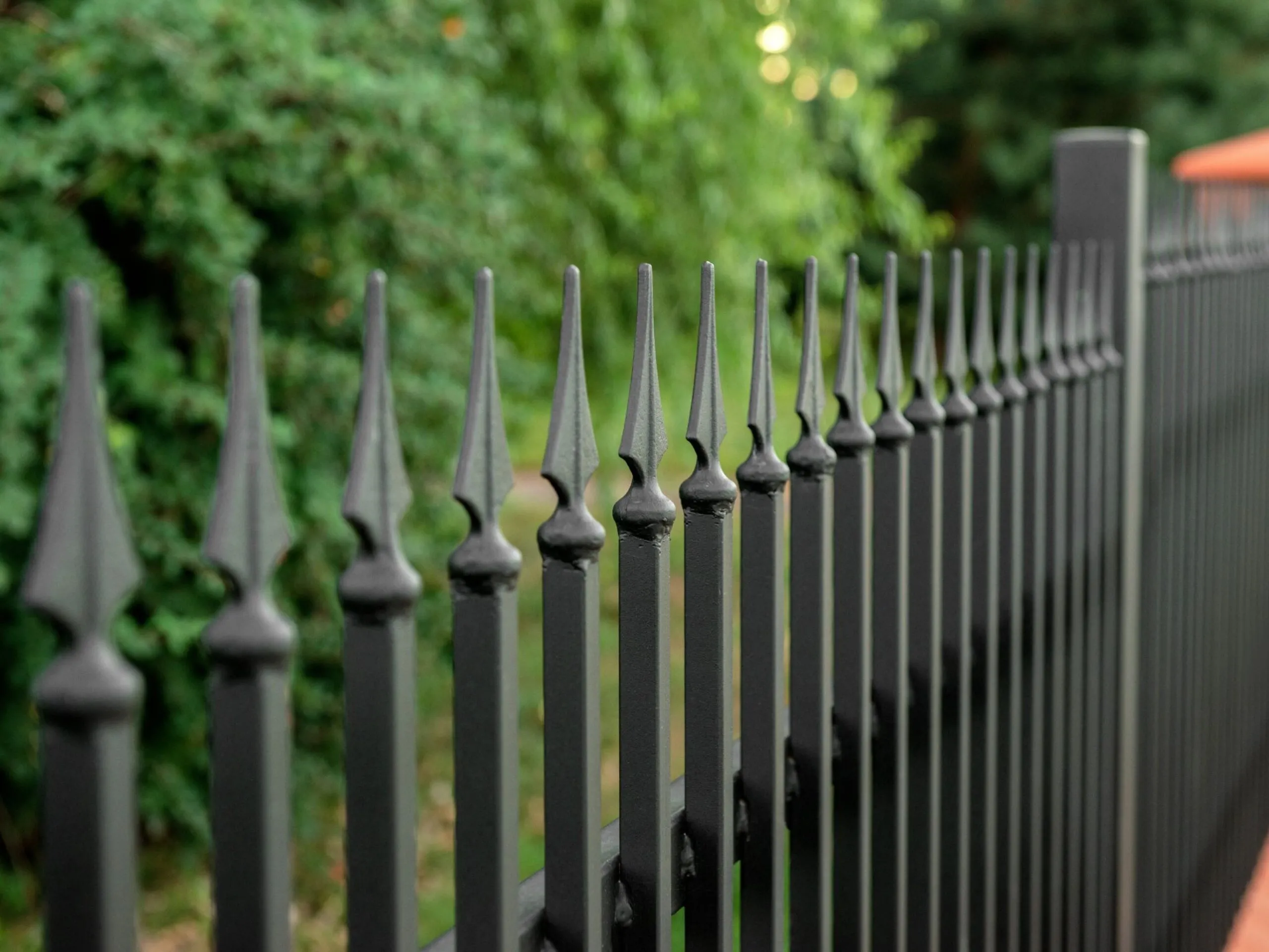 Black metal fencing rail